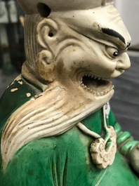 Een Chinese verte biscuit figuur van Yanluo, Kangxi