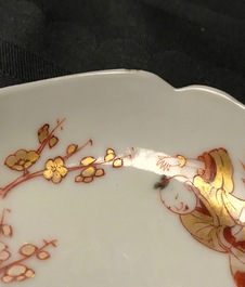 Three Chinese iron red eggshell cups and saucers with boys and goats, Yongzheng