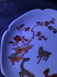 Three Chinese iron red eggshell cups and saucers with boys and goats, Yongzheng