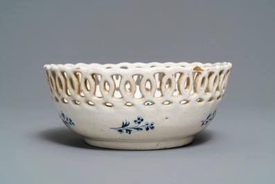 A blue and white Brussels faience '&agrave; la haie fleurie' reticulated basket, 18th C.