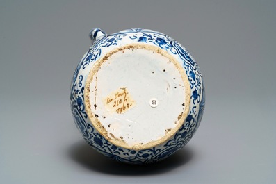 A Dutch Delft blue and white puzzle jug, dated 1737