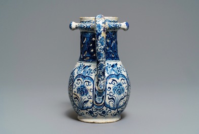 A Dutch Delft blue and white puzzle jug, dated 1737