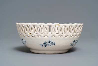A blue and white Brussels faience '&agrave; la haie fleurie' reticulated basket, 18th C.