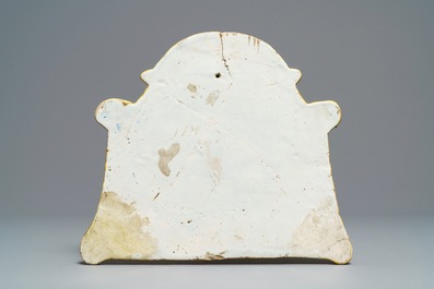 A polychrome Dutch Delft 'landscape' plaque with draperies, 18th C.