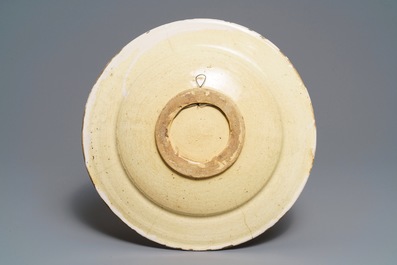 A yellow and manganese maiolica 'unicorn' dish, Delft or Friesland, 17/18th C.