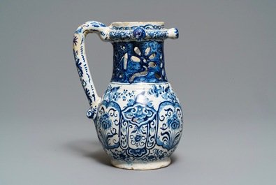 A Dutch Delft blue and white puzzle jug, dated 1737