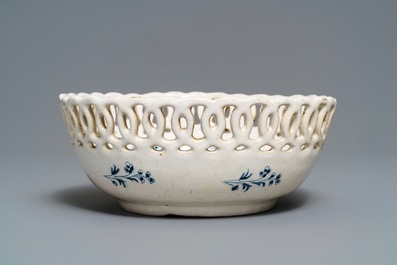 A blue and white Brussels faience '&agrave; la haie fleurie' reticulated basket, 18th C.