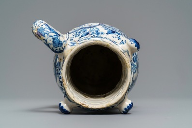 A Dutch Delft blue and white puzzle jug, dated 1737