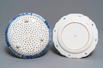 A Dutch Delft blue and white strawberry strainer on stand, 18th C.