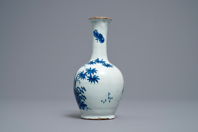 A Dutch Delft blue and white Kakiemon-style bottle vase, late 17th C.