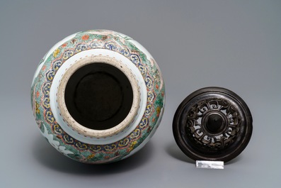 A Chinese famille verte vase with landscape medallions, Kangxi