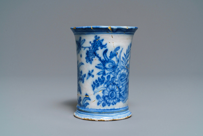 An extremely rare inscribed Dutch Delft blue and white beaker after a silver example, dated 1676