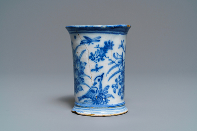 An extremely rare inscribed Dutch Delft blue and white beaker after a silver example, dated 1676