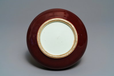 A Chinese monochrome red bottle vase, Kangxi