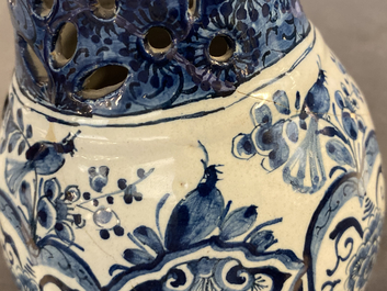 A Dutch Delft blue and white puzzle jug, dated 1737