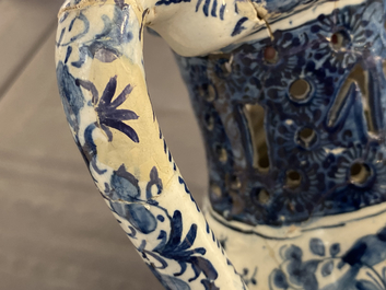 A Dutch Delft blue and white puzzle jug, dated 1737