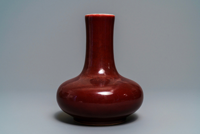 A Chinese monochrome red bottle vase, Kangxi