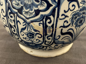 A Dutch Delft blue and white puzzle jug, dated 1737