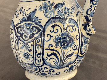 A Dutch Delft blue and white puzzle jug, dated 1737