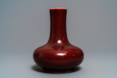A Chinese monochrome red bottle vase, Kangxi