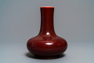 A Chinese monochrome red bottle vase, Kangxi