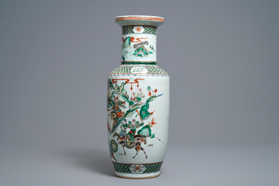 A Chinese famille verte rouleau 'warriors on horseback' vase, 19th C.