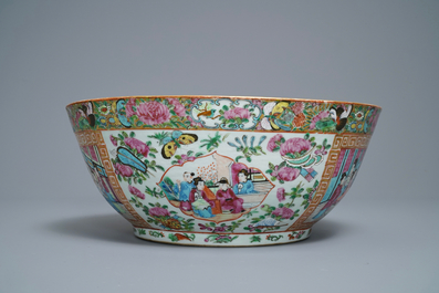 A pair of Chinese Canton famille rose vases and a bowl, 19th C.