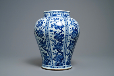 A large Chinese blue and white baluster jar with wooden cover and stand, kangxi