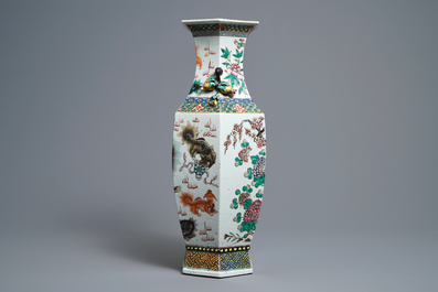 A Chinese hexagonal famille rose 'Buddhist lions and peacocks' vase, 19th C.