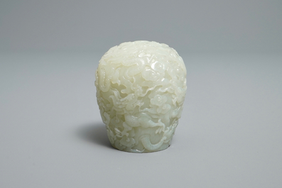 A Chinese celadon jade 'dragon' finial for a stupa, 19/20th C.
