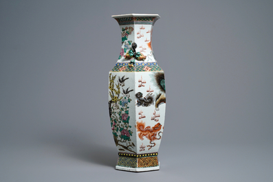 A Chinese hexagonal famille rose 'Buddhist lions and peacocks' vase, 19th C.