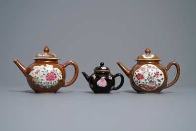 Three Chinese famille rose capucin- and black-ground teapots, Yongzheng/Qianlong