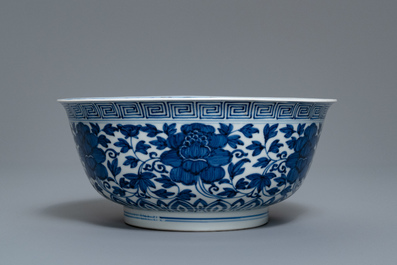 A Chinese blue and white 'peony scroll' bowl, Kangxi