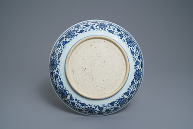 A Chinese Ming-style blue and white 'floral scroll' dish, Qianlong
