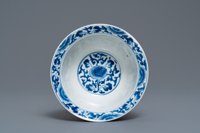 A Chinese blue and white bowl with floral scrolls, Kangxi
