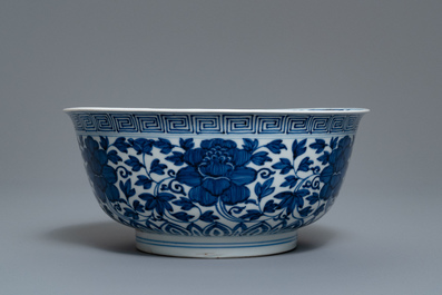 A Chinese blue and white 'peony scroll' bowl, Kangxi
