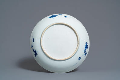A Chinese blue and white dish with a narrative scene, Kangxi