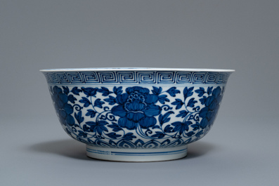 A Chinese blue and white 'peony scroll' bowl, Kangxi
