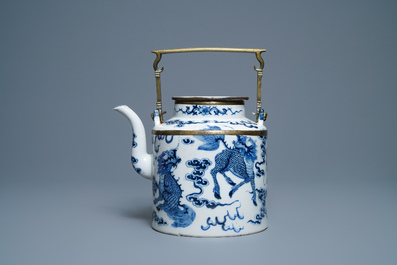 A large Chinese blue and white Vietnamese market 'Bleu de Hue' teapot with qilins, 19th C.