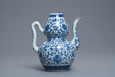 A Chinese blue and white 'bats and shou' jug, 19th C.
