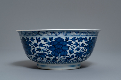 A Chinese blue and white 'peony scroll' bowl, Kangxi