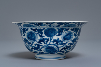 A Chinese blue and white bowl with floral scrolls, Kangxi