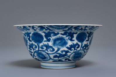 A Chinese blue and white bowl with floral scrolls, Kangxi