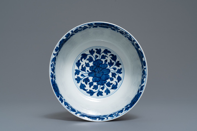 A Chinese blue and white 'peony scroll' bowl, Kangxi
