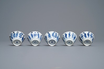 Ten Chinese blue and white 'Long Eliza' cups and saucers, Kangxi
