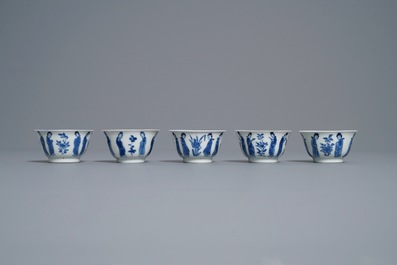 Ten Chinese blue and white 'Long Eliza' cups and saucers, Kangxi