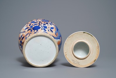 A Chinese blue and white clobbered 'qilin and phoenix' vase and cover, 19th C.