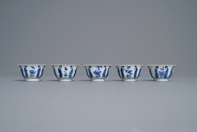 Ten Chinese blue and white 'Long Eliza' cups and saucers, Kangxi