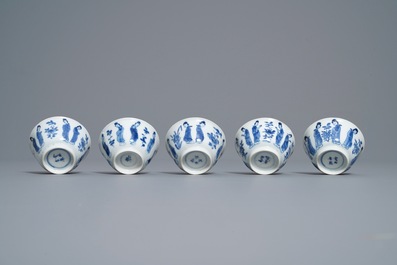 Ten Chinese blue and white 'Long Eliza' cups and saucers, Kangxi