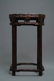 A Chinese huali wooden stand with famille rose plaque, Jiaqing